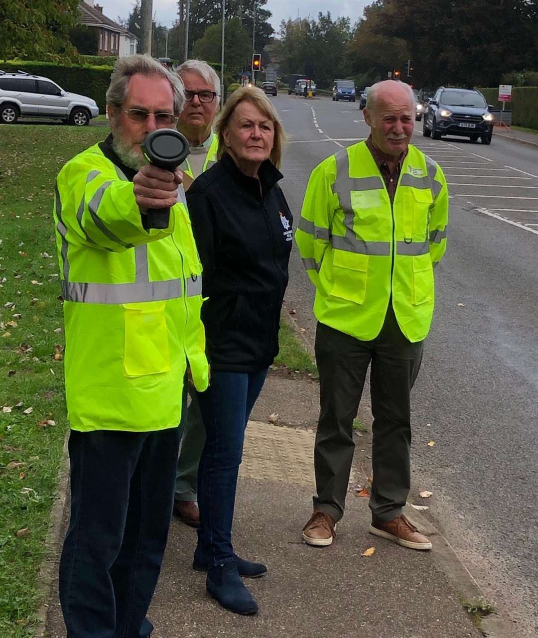 Coun Jan Whitbourn with a community speedwatch group PHOTO: STOCK