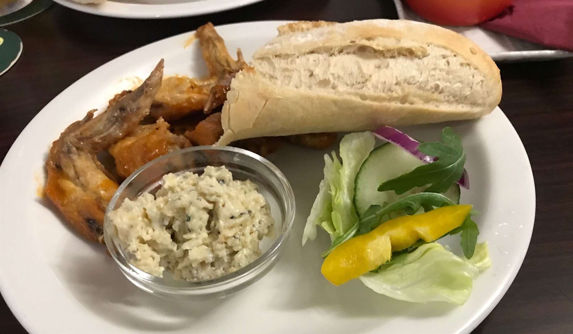 Chicken wings with a crusty baguette and delicious home-made Stilton dip.