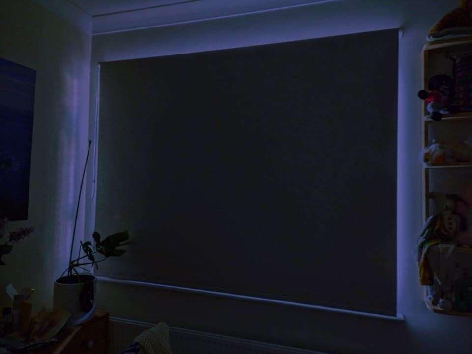 Residents have complained about bright Christmas lights. This picture is of the light coming around a blackout blind