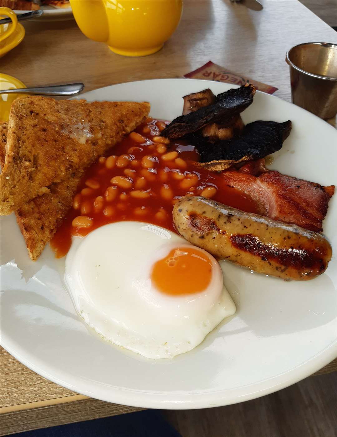 Sumptious Full English with beans on the plate!