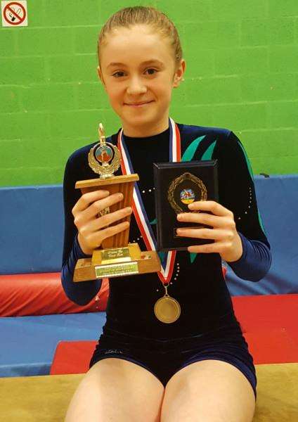 Under-16 Advanced champion Lila Ede.