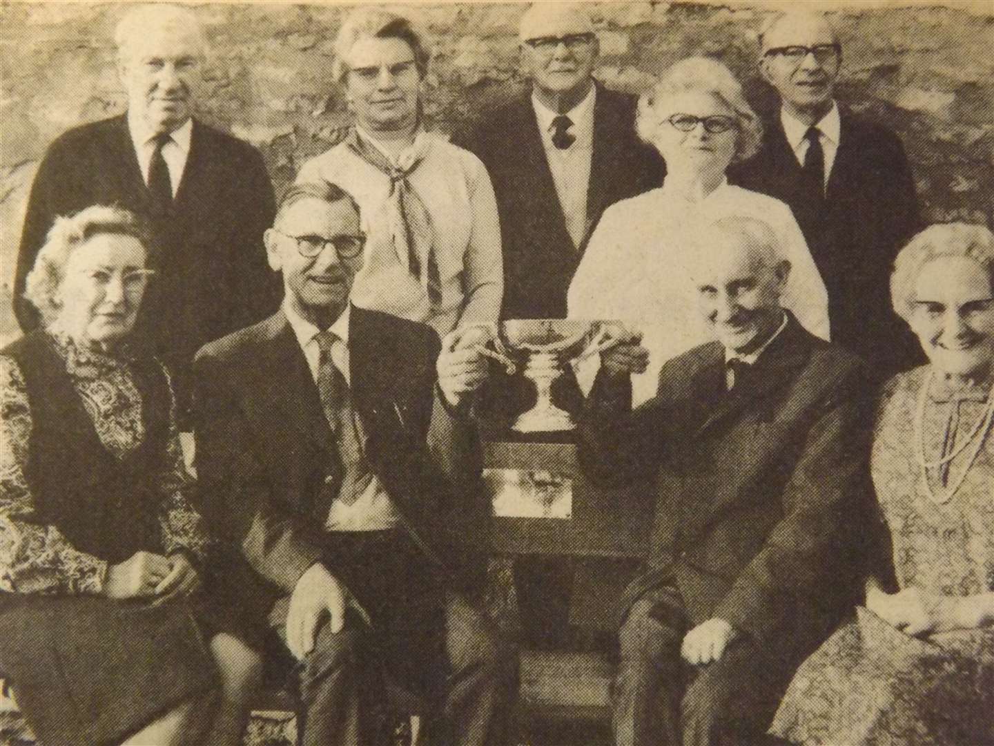 50 years ago: October 26, 1973 – Market Deeping Welcome Club founder members Mr J. Axtell (seated, second left) and Mr W. Dew (seated, second right), pictured showing other club members the Bembridge Cup presented to the club for the best scrap-book, which they compiled.