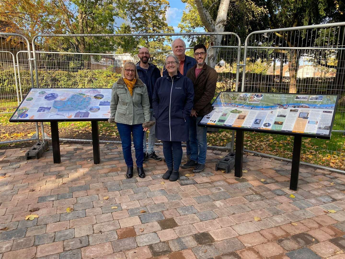 Artist Ann Wakeford, chairperson of Bourne History Group Steve Guilliari, trustee of Bourne United Charities Susan Bennett, Robin Jones editor of Heritage Railway magazine and Graham Copestake of Sparx Creative