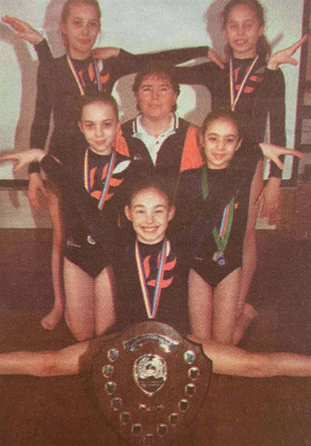 The Stamford High Junior School under-10 gymnastics show off their shield and medals 25 years ago.Picture are (standing from left) Eleanor Wells, Mary Jo Knight, (kneeling) Siobhan Bailey, gymnastics teacher Trudy Smith, Hannah Hounslow and Laura Cress (front).