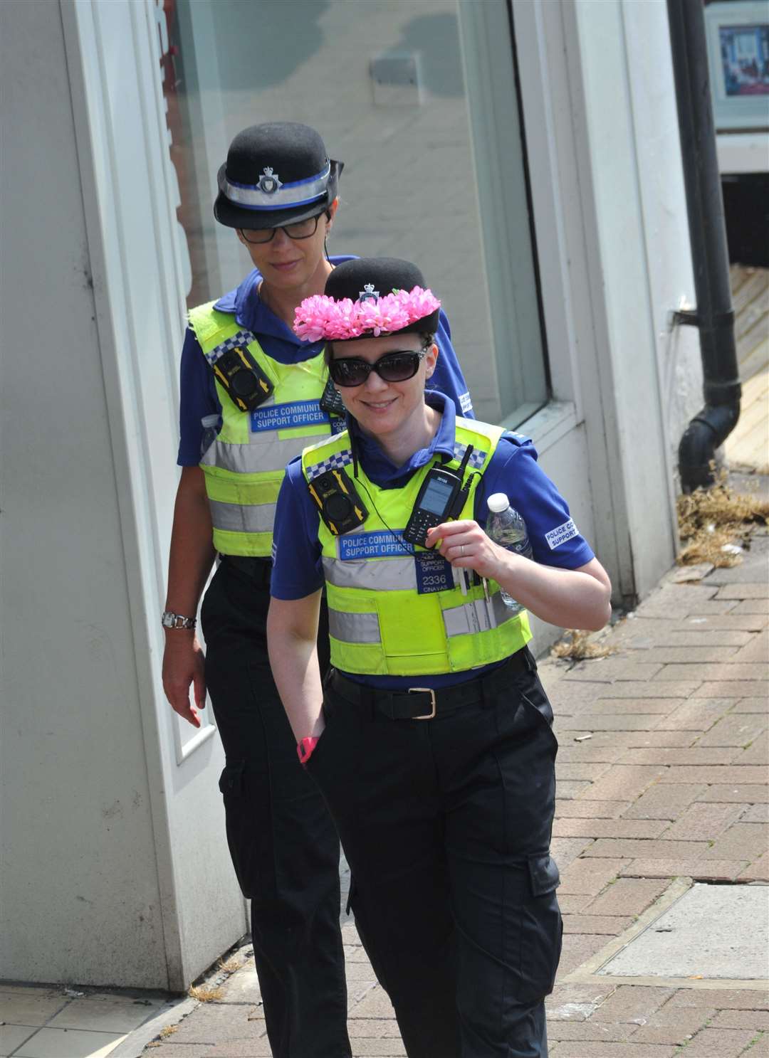 Police got into the Flower Parade spirit as they kept the well-behaved crowd safe. Photo: Chris Lowndes