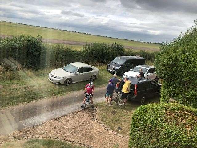 Cars parked along Longhedge Lane, including on a resident's lawn, during a private airshow at RAF Syerston in August 2022. Photo: Peter Moyes. (61714262)
