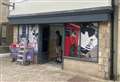 Signs appear for high-end fragrance shop as work begins
