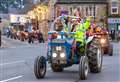 Festive tractor run lights up the town