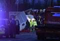 Overturned horse box closes road