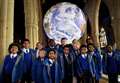 Schoolchildren enjoy giant replica of planet Earth as it goes on display at St Wulfram's Church
