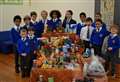 School donates harvest collection to foodbank