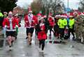 Santa Fun Runners had smiles on their faces