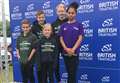 Young triathlete carries GB flag 