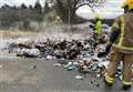 Seven tonnes of blazing waste dumped in street by bin lorry crew