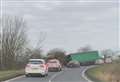 Busy road closed due to jackknifed vehicle