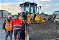Farmers deploy digger bucket in rescue mission to get elderly residents and pregnant woman from flooded homes