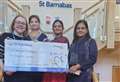 Diversity group presents £500 to hospice