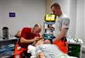 Volunteer doctor scheme expands to help under-pressure ambulance service