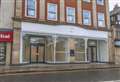 Town salon celebrates 10 years with move to bigger location