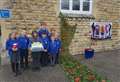 Pupils create poppy display using recycled materials 