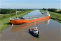 ‘Lapse in concentration’ may have caused cargo ship to become stuck across river