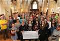 ‘Best of Grantham’ receives £30,000 raised by RotarySwimarathon supporters