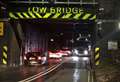 Police attend to lorry stuck under railway bridge
