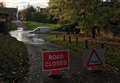 Driver caught out by high flood waters