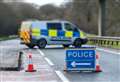 Crash closes road near railway crossing