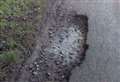 Villagers brand potholes 'terrible' 