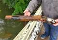 Sawn-off shotgun pulled out of river 