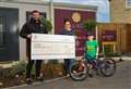 Young fundraiser visits new estate to thank developer for donation