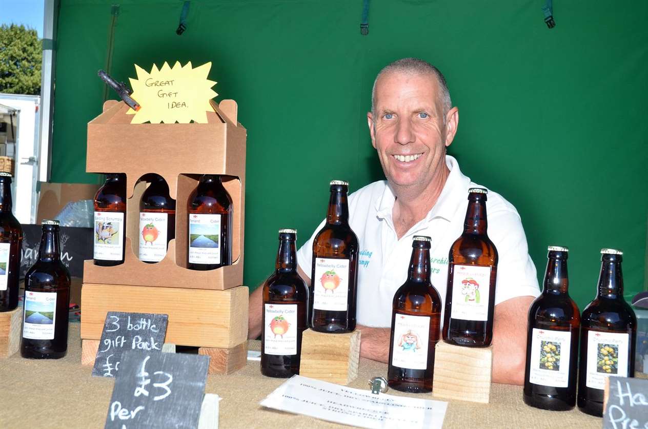 Trevor Corney with brews from Churchill Ciders of Spalding. Photo: 010718123SG.