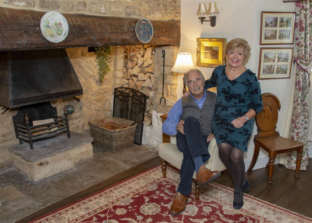 David and Nicky Shelton alongside the Inglenook Fireplace Photo: Lee Hellwing