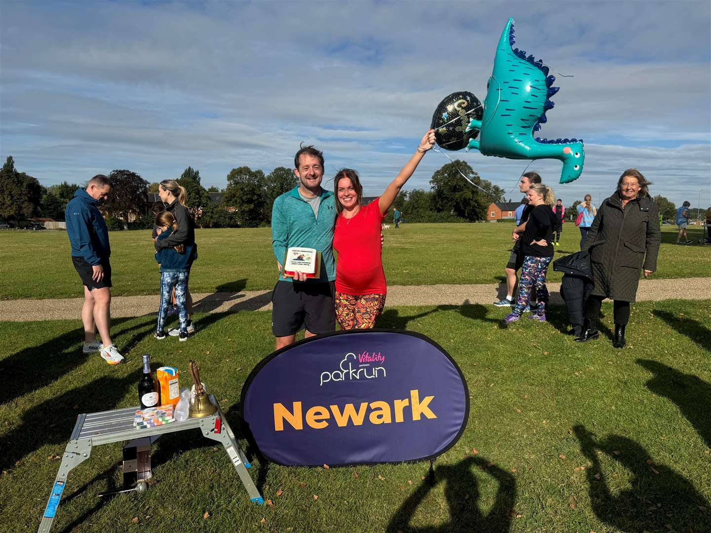Samantha (right) with her partner at the finish line.
