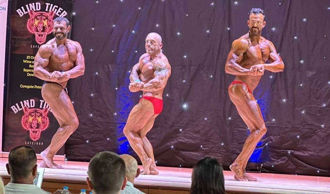 Rob Harris posing on stage