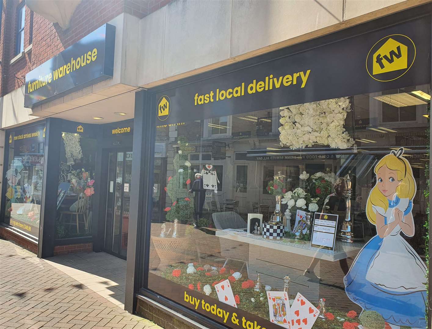 Furniture Warehouse in Spalding decorated their window with an Alice in Wonderland theme in the Spalding Flower Parade competition
