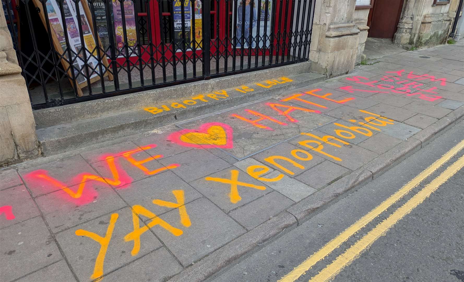 Graffiti has appeared outside the theatre.