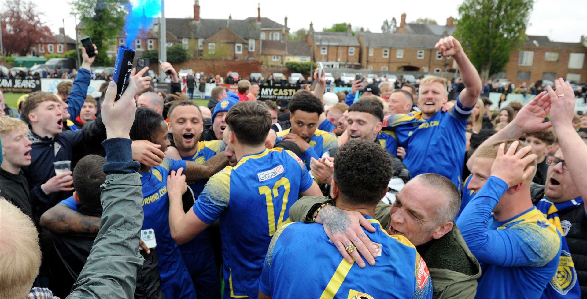 The Spalding players celebrate with their fans. Photo: Chris Lowndes