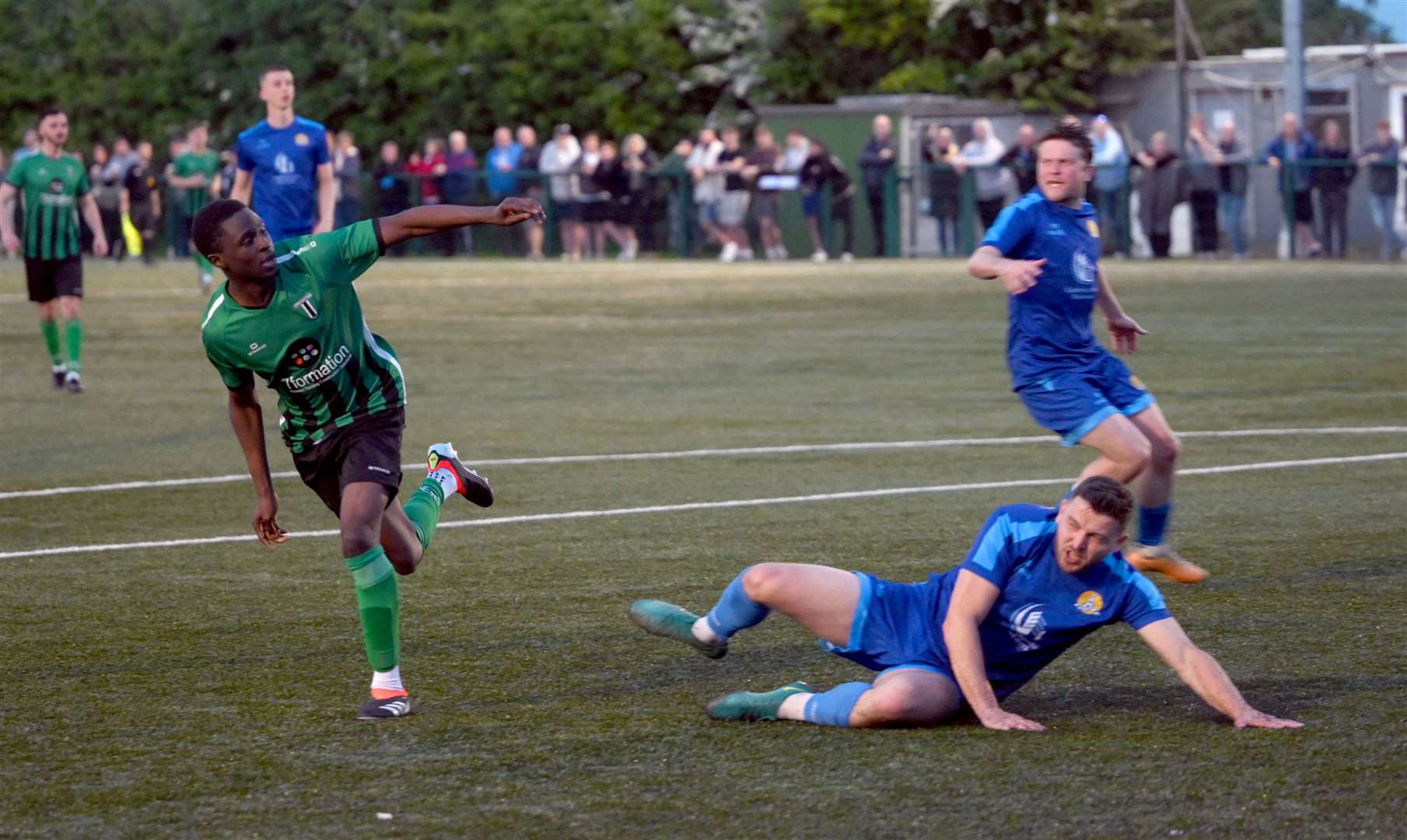 March (Blue) v Blackstones (Green and Black) in the final of the Hinchingbrooke Cup Blackstones scoring to make it 1-1