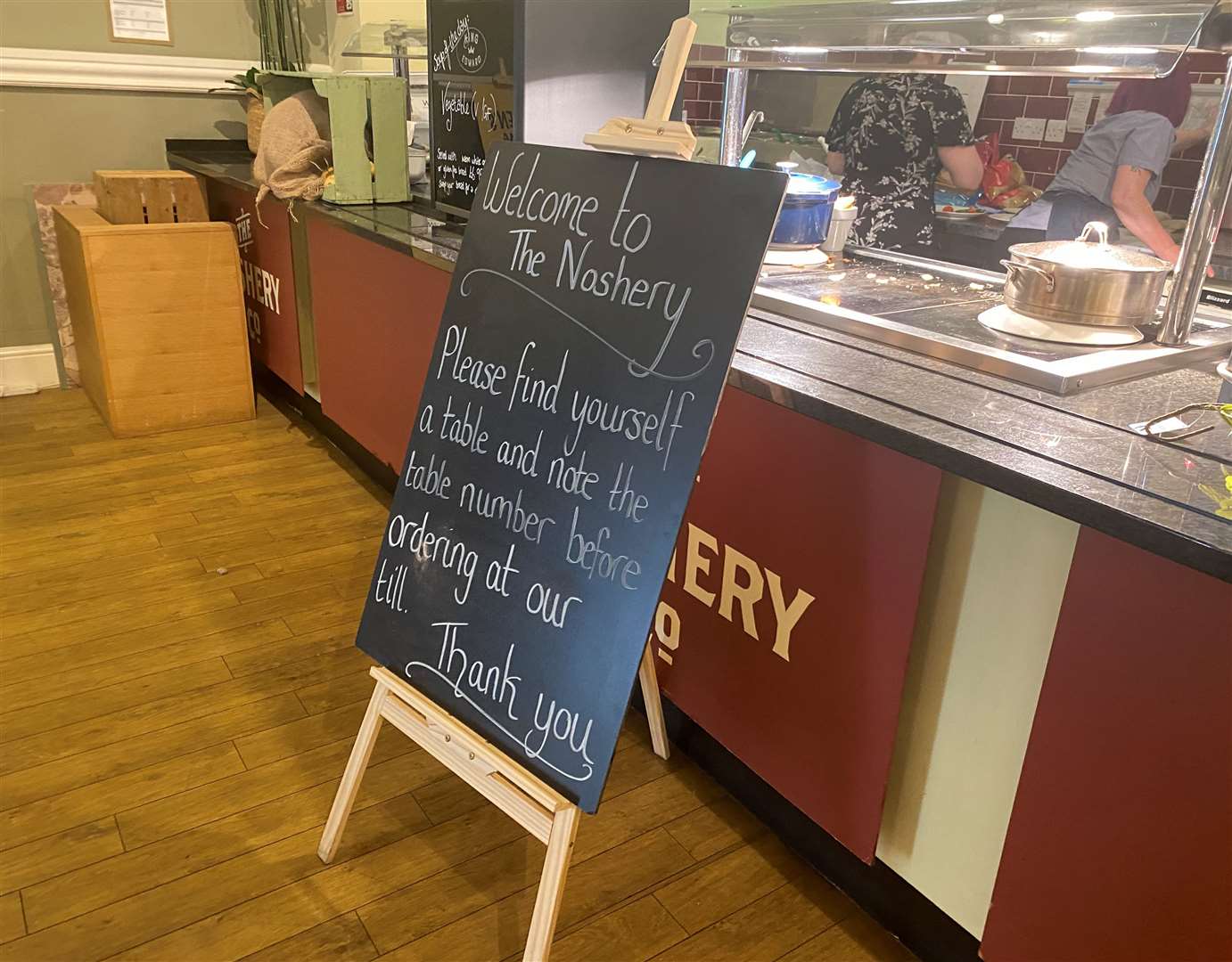 The Noshery welcome sign