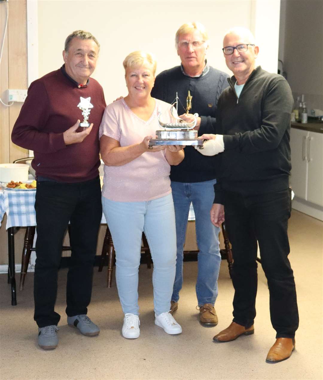 Commodore Sarah Prior with club champion Andy Prior, runner-up Mark Scourfield and Alan Cox who came third.