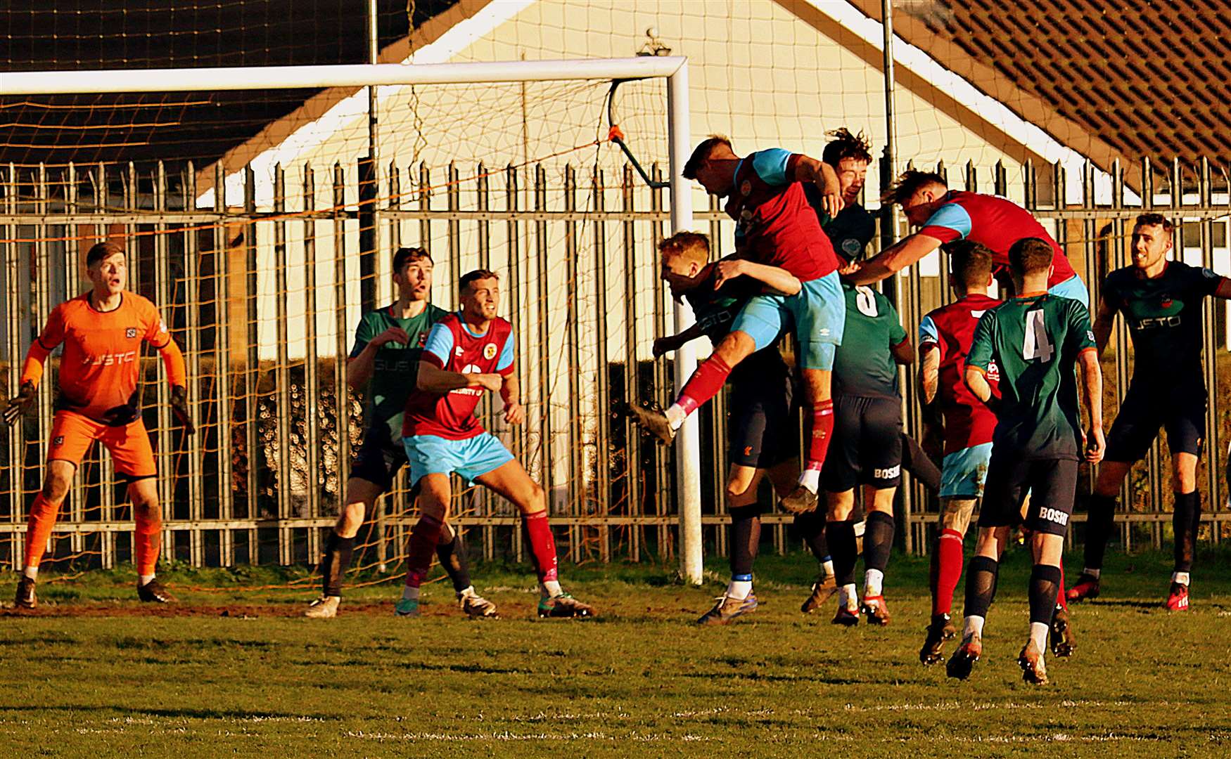 Ross Woolley looks on as the defence does their work for the hosts. Images: Rob Currell.