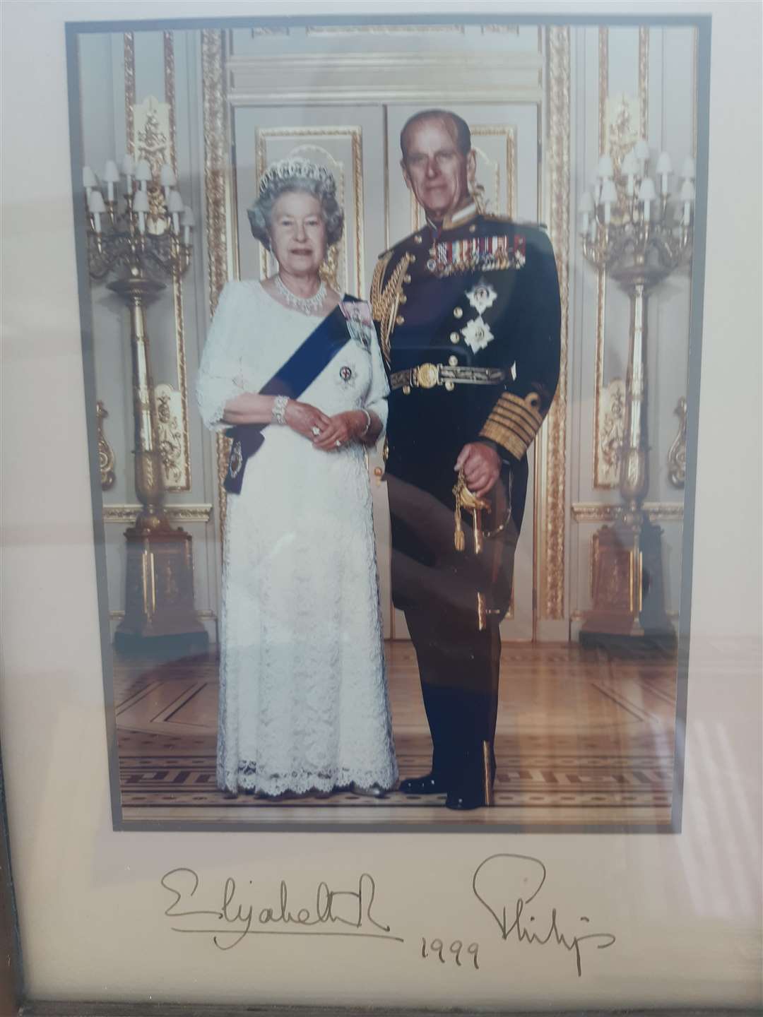 A photo signed by the Queen and the Duke of Edinburgh