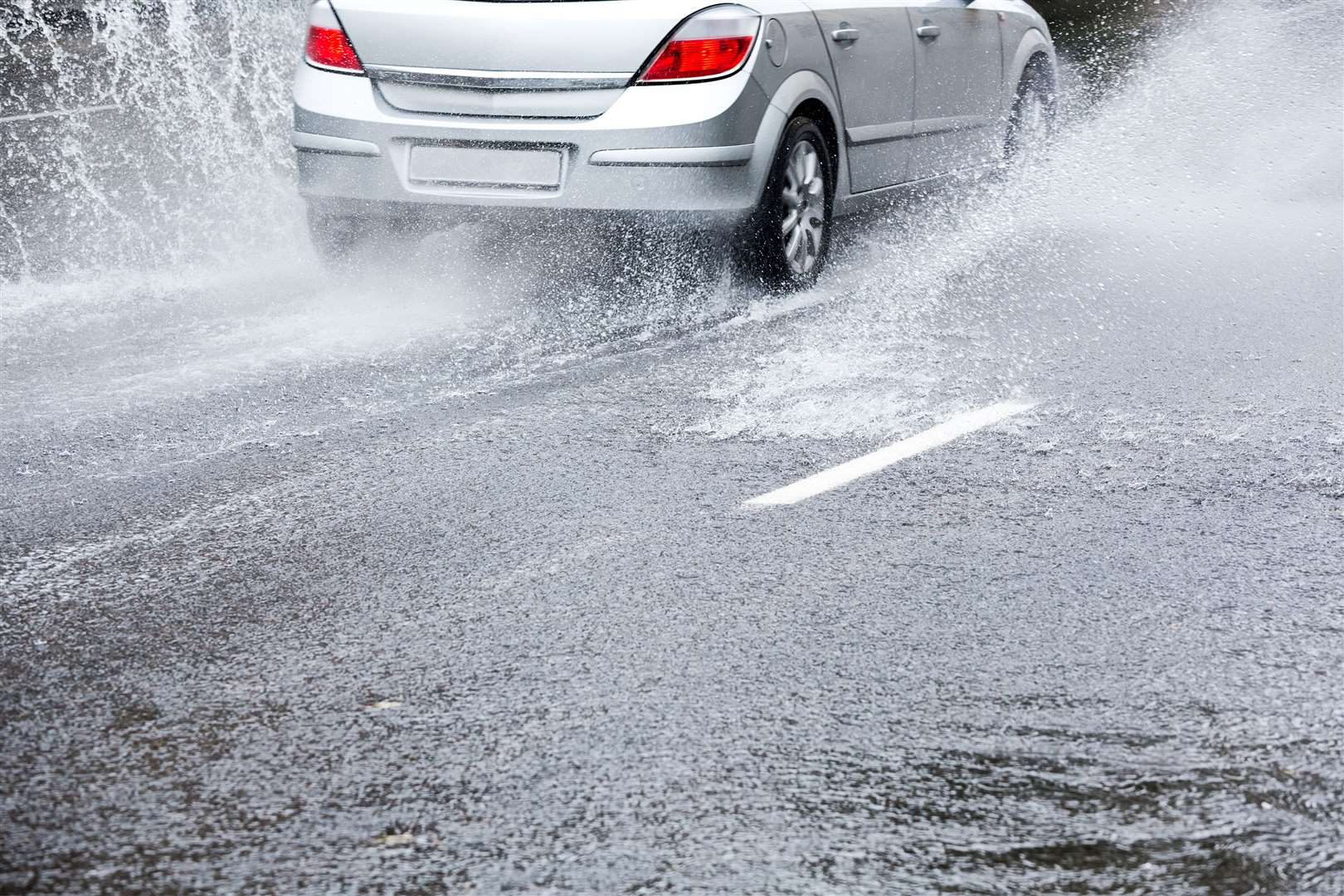 Driving through a puddle and splashing someone could land you with a fine.