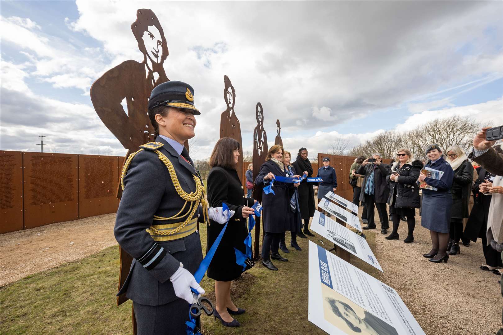 Suraya Marshall helps to unveil silhouettes. Photo: International Bomber Command Centre
