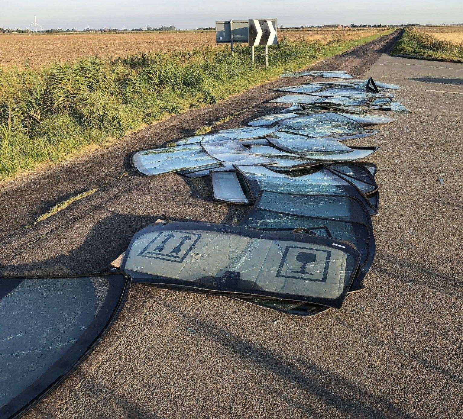 Car windscreens dumped at the junction of Green Drove and The Chase in Crowland. (17540127)