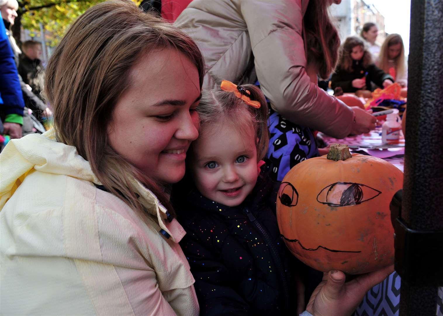 Laura Peteova and daughter Macia 2 with their pumpkin