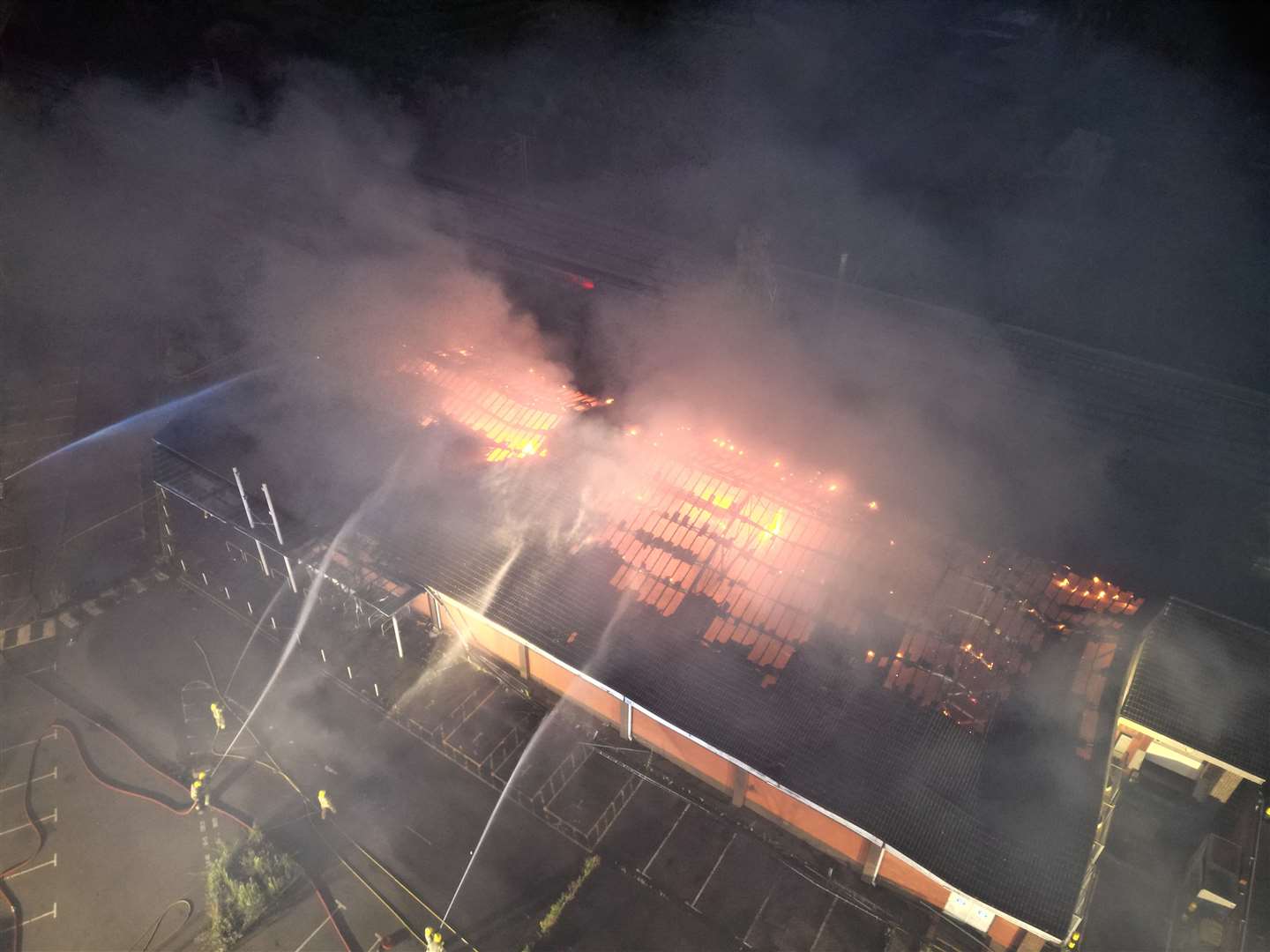 Drone photos show the extent of the fire at the former Aldi store. | Photo: Jake Harris