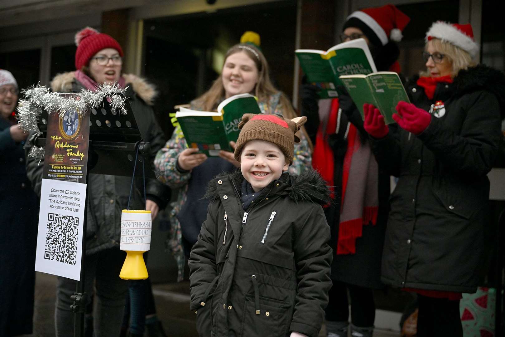 Carol singing to get into the Christmas spirit.